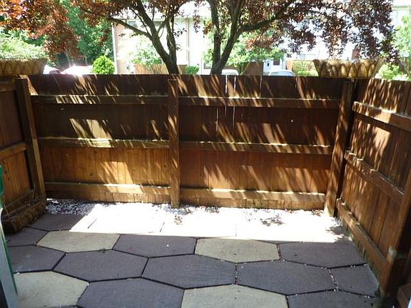 Front Patio; Fence has since been redone with cream vinyl!