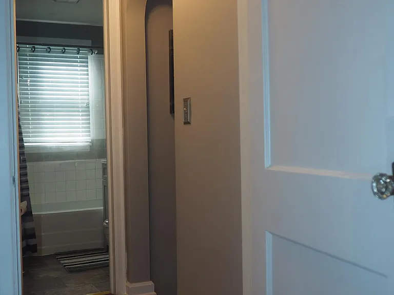 Hallway, stairs and bath from master bedroom.
