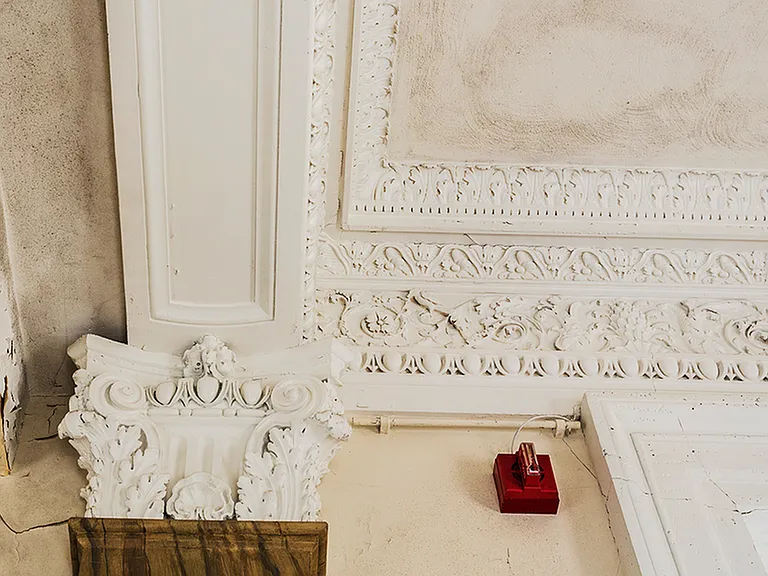 Before: Architectural accent of ceiling molding with historical value