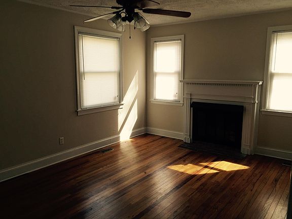living room with gas log fireplace