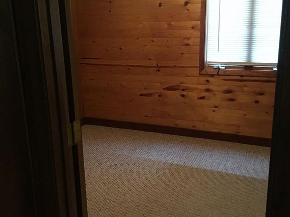 Master bedroom has private access to bath.