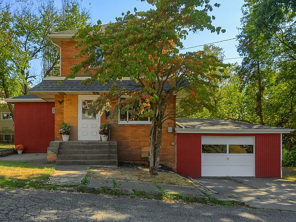 This home features 3 nicely sized bedrooms (one is on the main level), a finished basement, and a one car integral garage (with additional parking for two more cars).