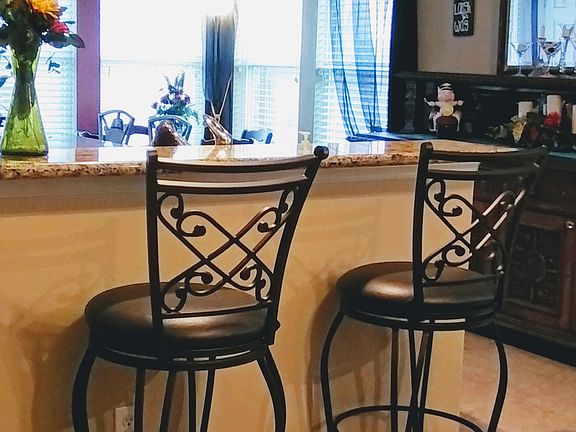 Bar overlooking the kitchen