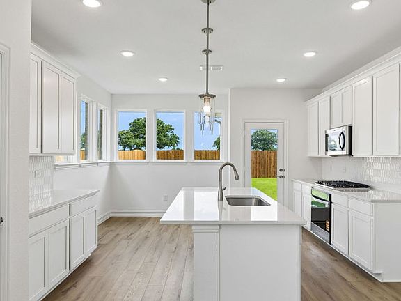 Abundant cabinet space in kitchen