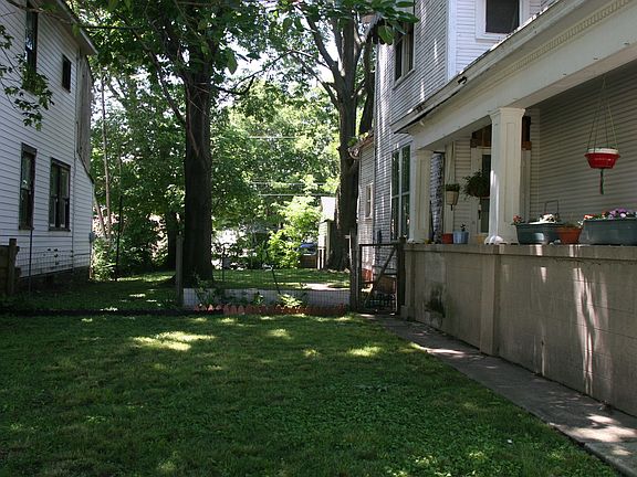 Left side of house and yard