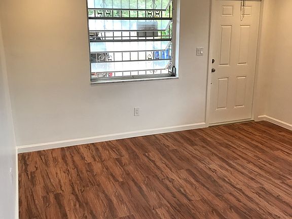 Living/Dining with new floors throughout