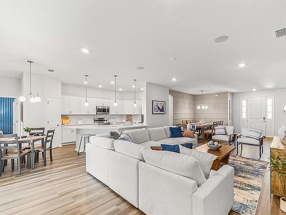 This spacious home features a versatile open-concept layout - Westin II by Highland Homes