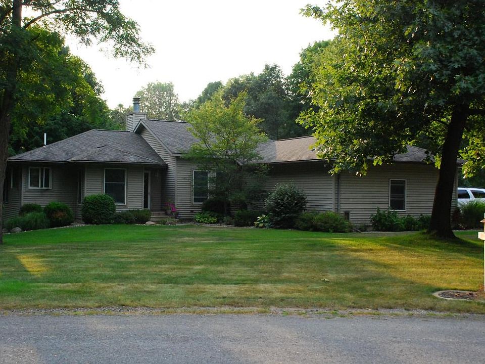 1st image of 65810 Omena Lake Ct