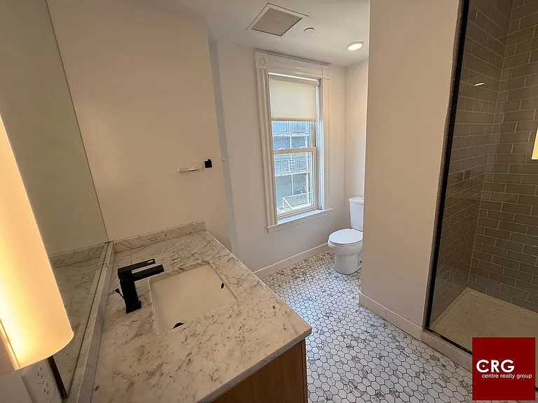 83-84 Gardner St #200L — Photo 23