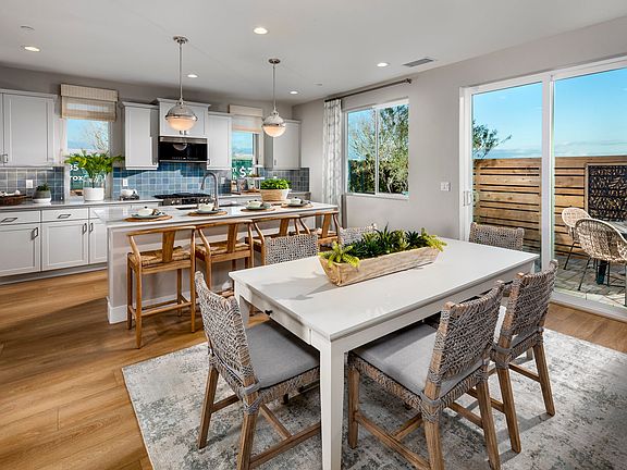 Sundrenched Dining Kitchen with easy access to back yard