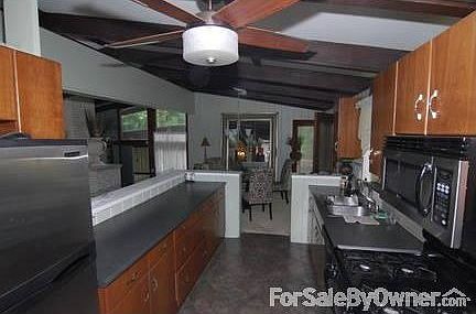 Lots of Kitchen work space.
						:
						Stainless Steel appliances add spice to this kitchen!