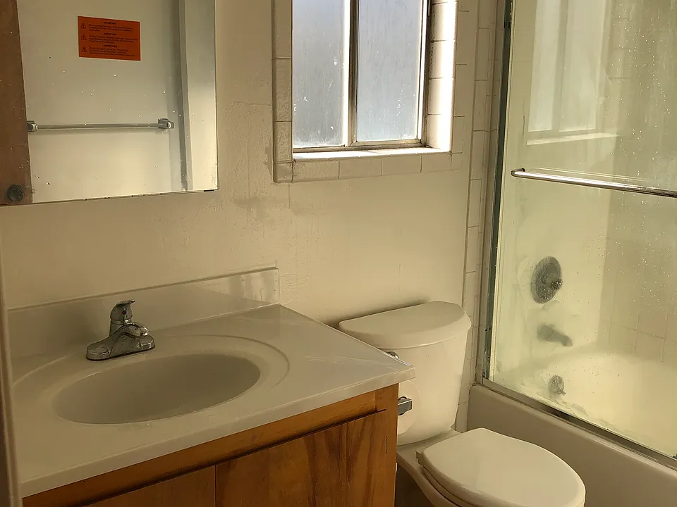 Full bathroom with double pane window