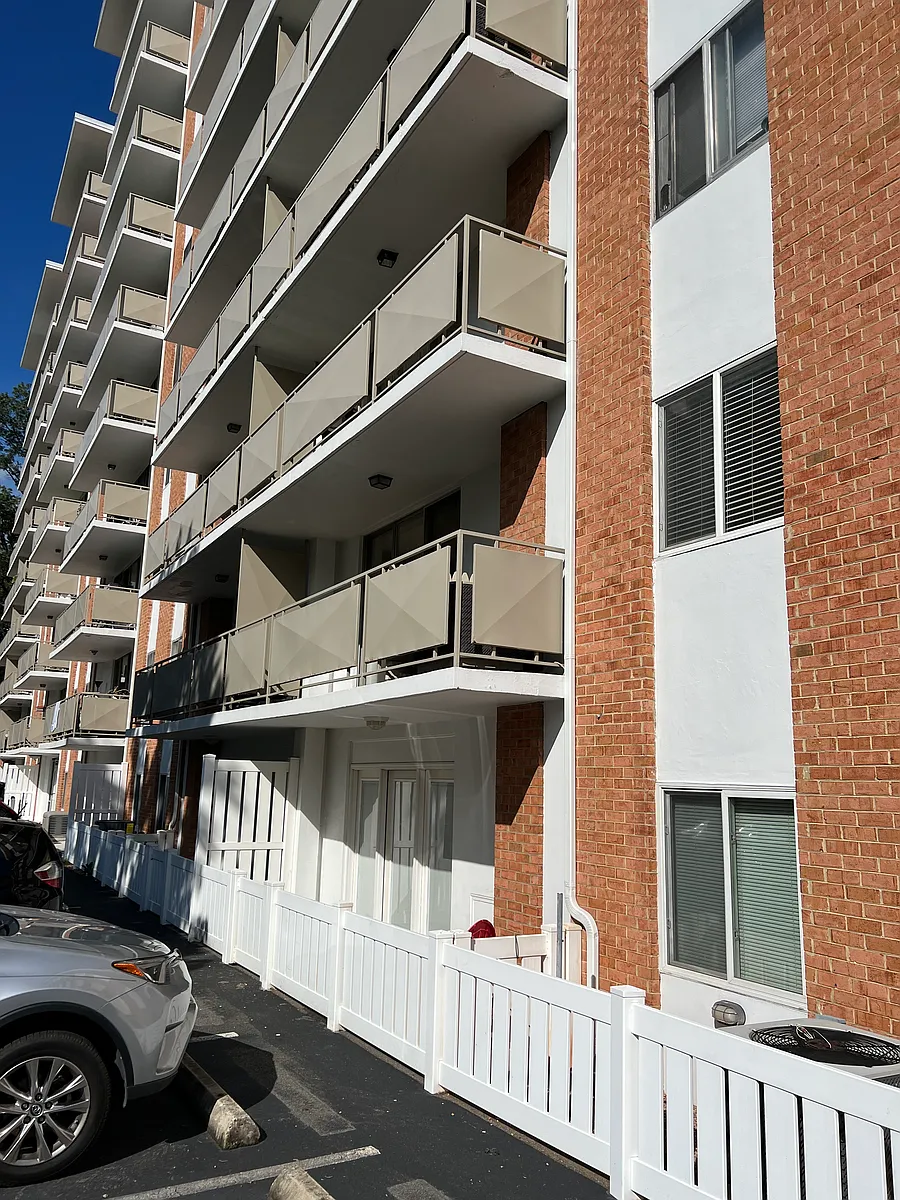 Unit is on the main floor (one level up from the basement / ground floor). It is the first balcony you see. - 1800 Jefferson Park Ave #207