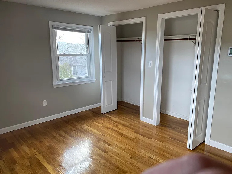 Bedroom with double closets