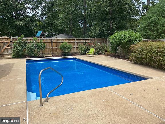Pool surrounded by landscaping