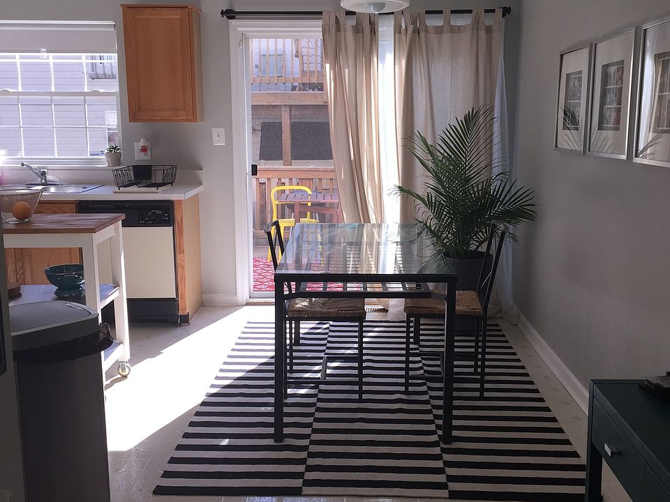 Living Room facing Dining Room to Deck