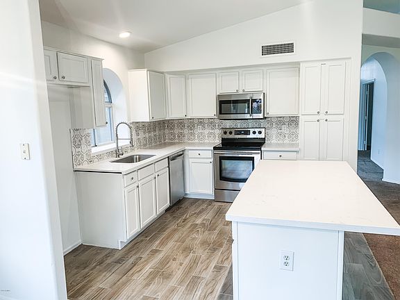 5th image of 7536 E Keats Ave