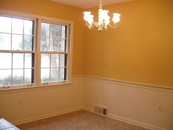 Bright dining area of Kitchen-light pours in from large windows