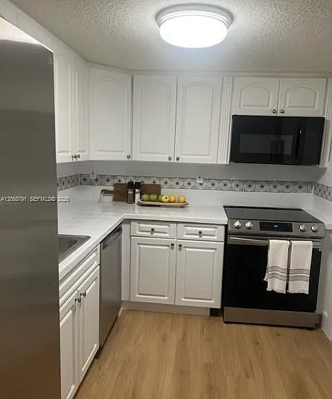 7947 SW 104th St #202-C — Photo 2