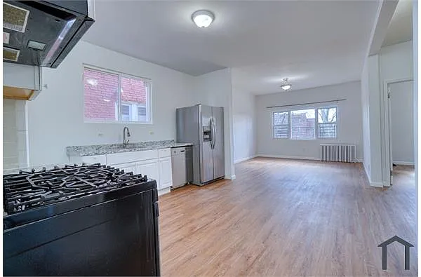 Building Photo - 6039 Maspeth Ave #2