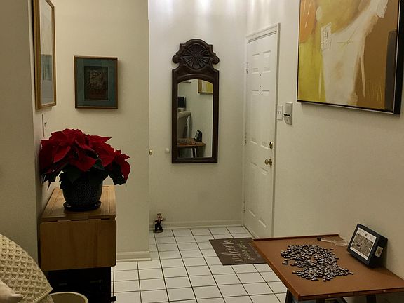 Foyer with coat closet.