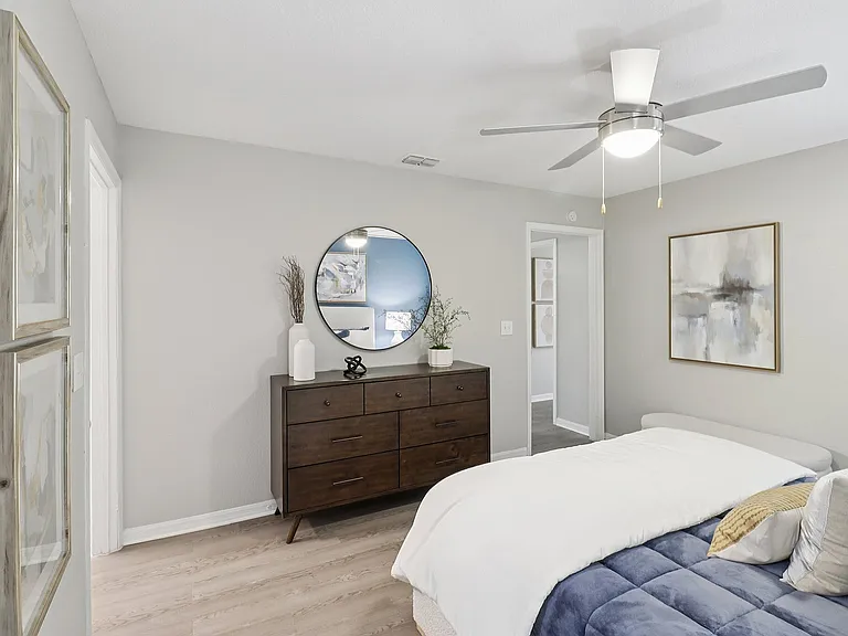 Spacious bedroom with modern design and ample storage