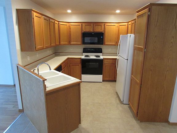Large kitchen with oodles of cabinets!