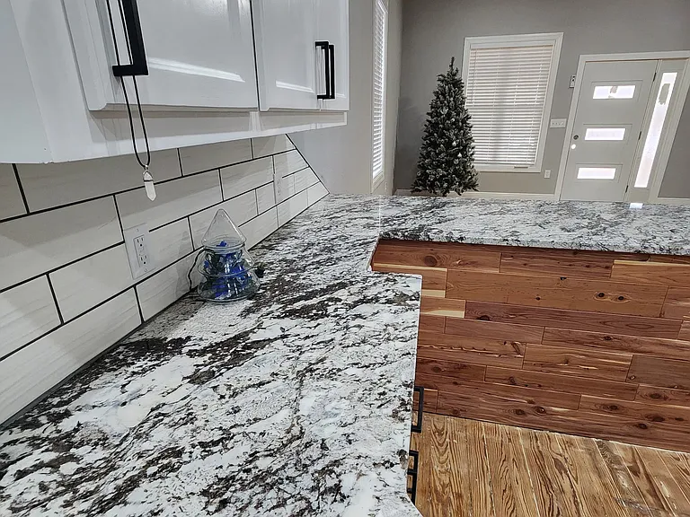 Living room and Quartz Kitchen countertops (view from kitchen)