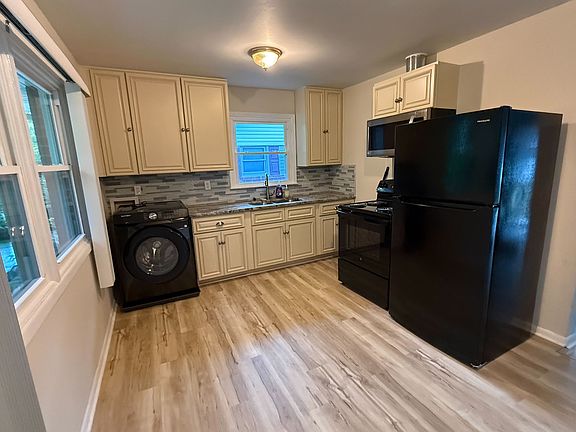 New appliances, washer, stove, refrigerator, and microwave