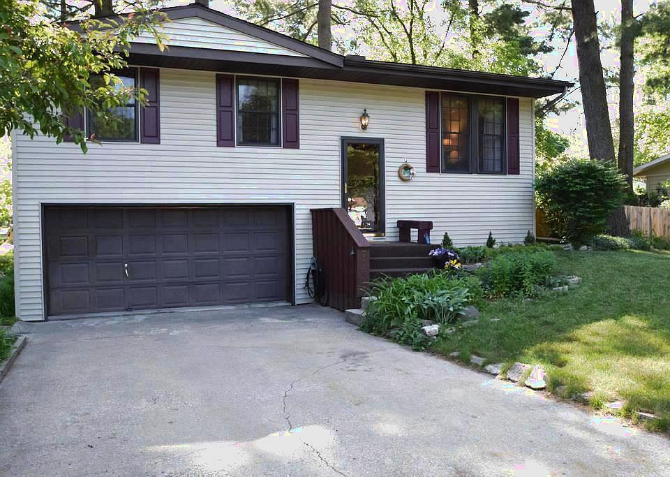 METICULOUSLY MAINTAINED.  Your new home features a newer roof, flooring, and an updated bath.  Everything is move-in ready and includes a newly fenced yard that is beautifully landscaped.  Even the shed is new.  All appliances stay.  Quiet location with wooded walking trails and school yard just 2 doors away.