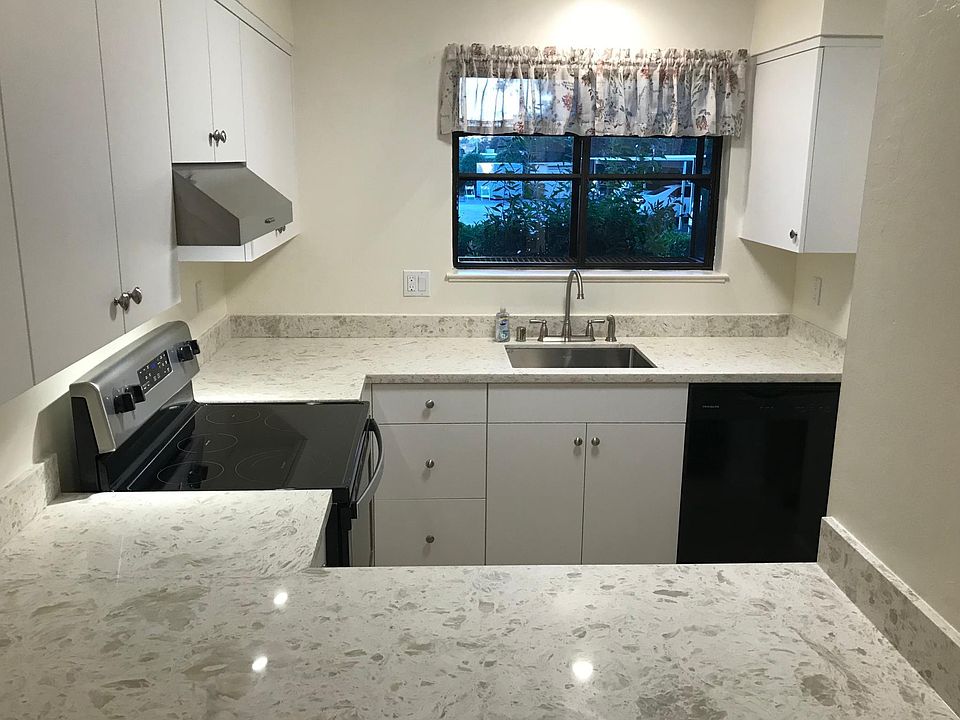 Brand new kitchen, including cabinets, counter tops and appl