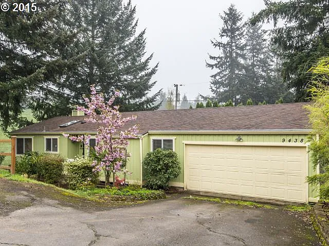 9438 NE Hancock Dr photo 1