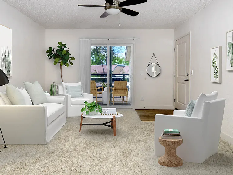Carpeted Living Room with Balcony