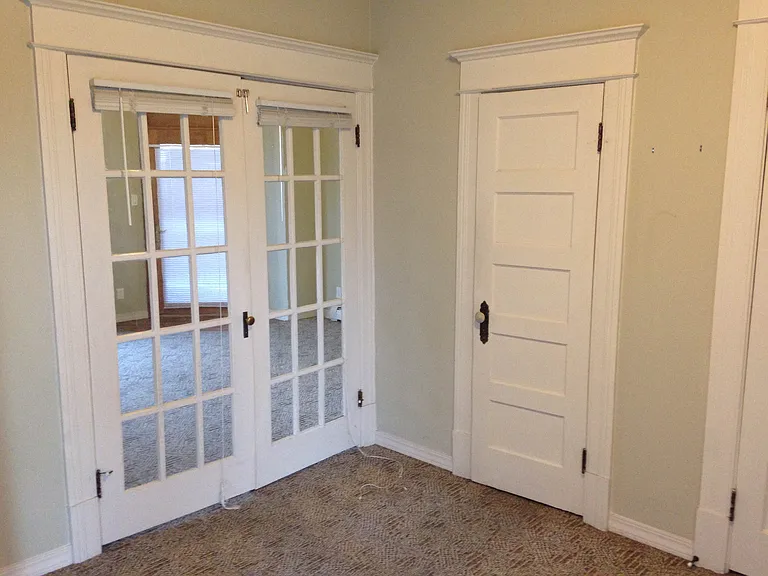 Bedroom 2, Love the French doors! Units may differ slightly.