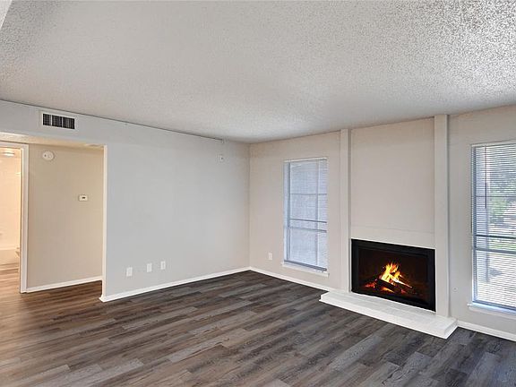 ANOTHER VIEW OF THE LIVING ROOM