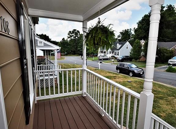 Country Porch, decking has just been stained and ready for your porch swing and rocker