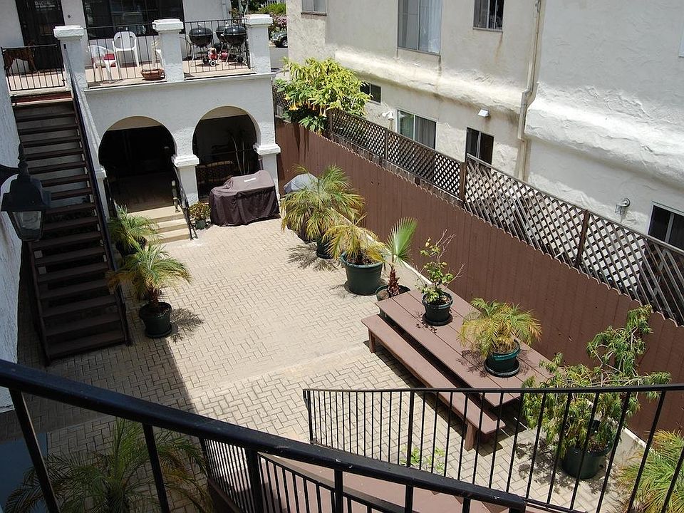 View of the private/gated courtyard from the front door of the unit (at the top of the staircase).