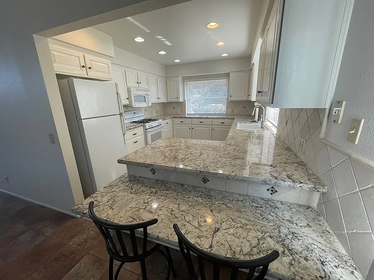 Kitchen with breakfast bar.