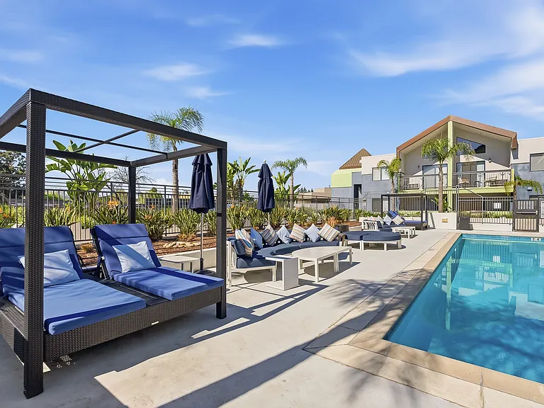 Make every day feel like a resort day with outdoor cabanas and a resort-style swimming pool.