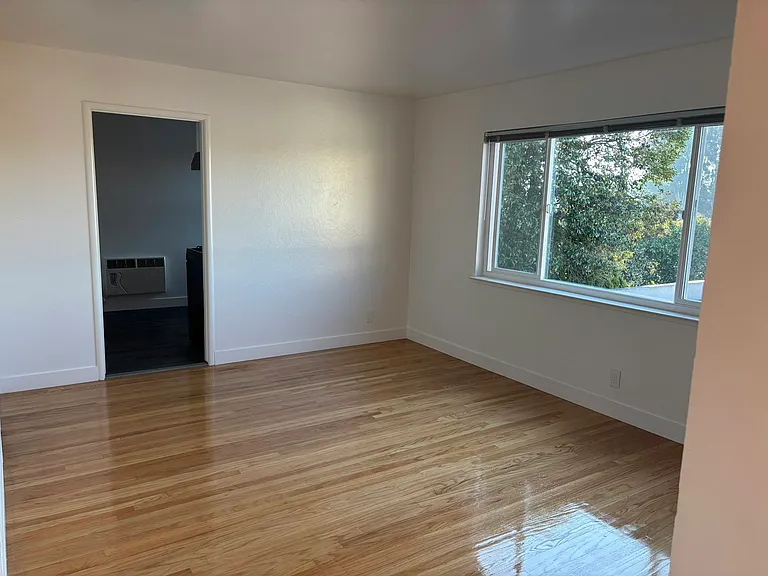 Bright, 2 bedroom apartment home with gorgeous hardwood floors and spacious living area