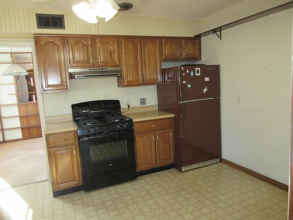 The kitchen has an eating area included.