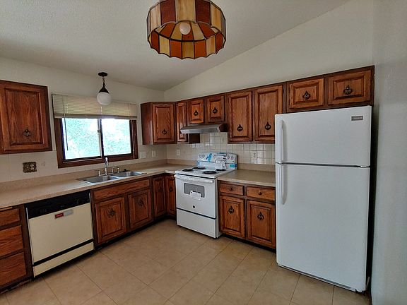 Kitchen Area with Newer Range and Range Hood