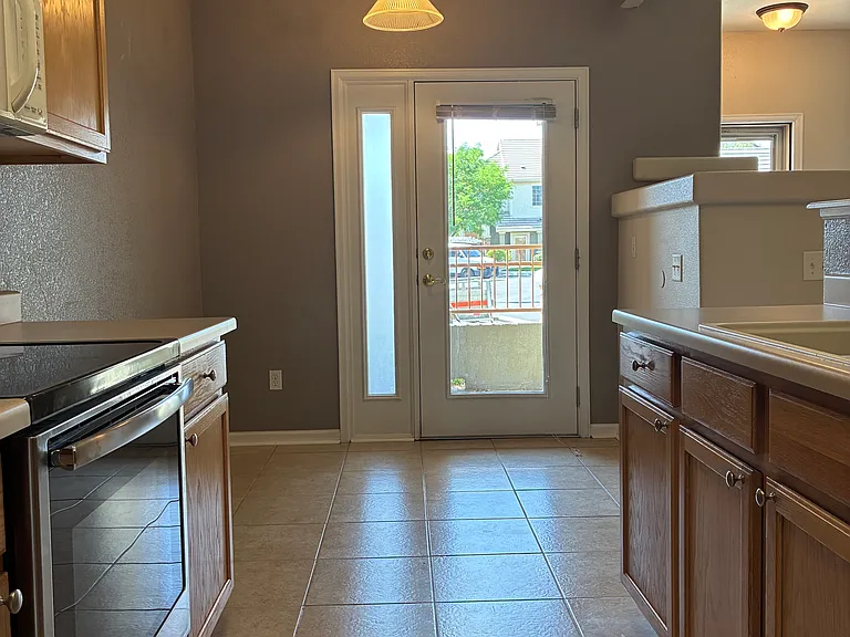 Eat-in area is 8'x8' and leads to an enclosed porch and storage closet
