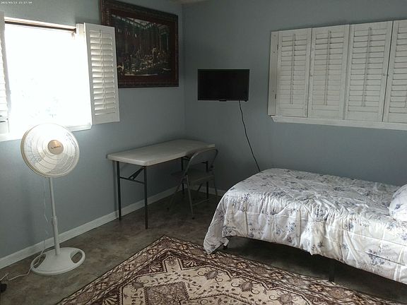 12x10 room. Twin memory foam mattress. Work station. Fan. Doublewide windows.