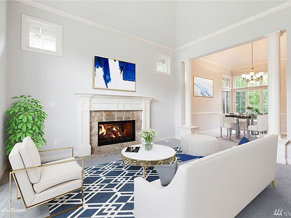 Formal living with vaulted ceiling. Fresh paint and brand new carpet.