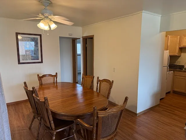 From dining room you can see kitchen, bathroom and entry to two bedrooms.