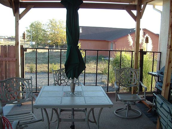 End of patio, privacy fence