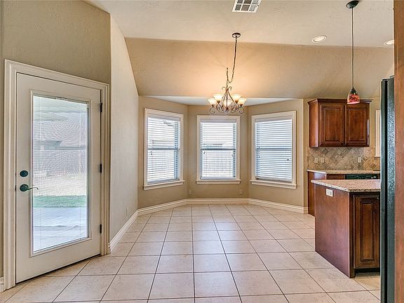 Dining room and door leading to backyard