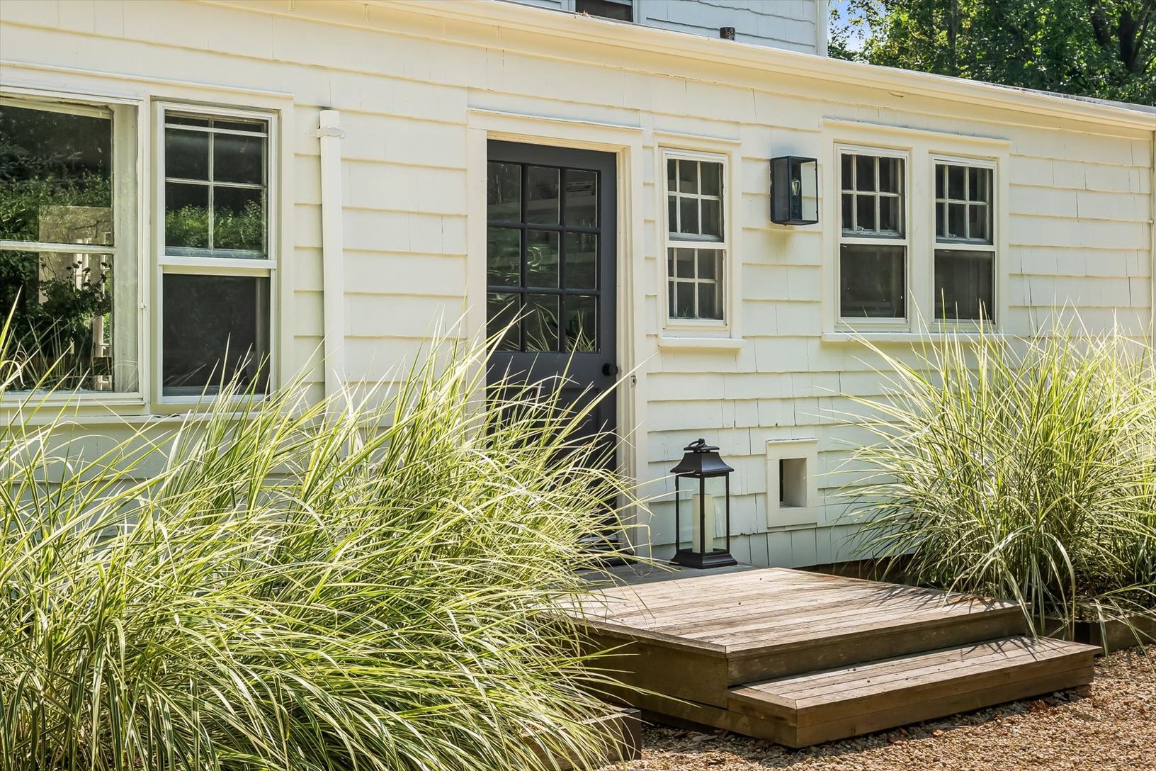  Side entrance to kitchen w/ beach grass 