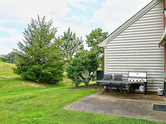 Back yard view with patio.